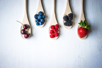 Berries on wooden background