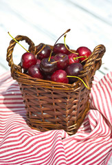 Fototapeta na wymiar sweet cherry fruit in basket outdoor