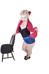 Fototapeta premium Woman in pin-up swimsuit posing - Isolated