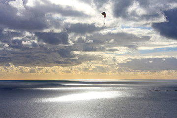 paraglider at dusk