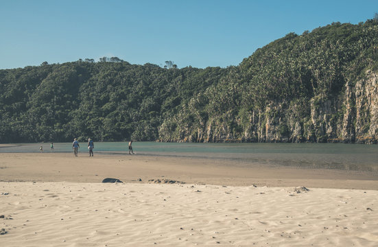 Tourists on sunny beach with blue sky. Gonubie. Eastern Cape. So