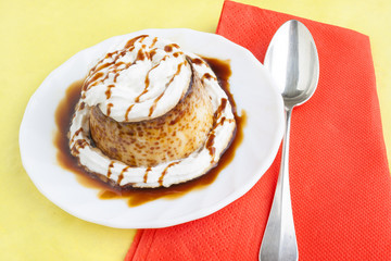 Pudding with cream and syrup