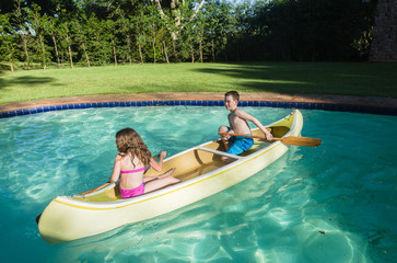 Boy Girl Canoe Pool