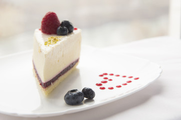 Piece of cheesecake with berries