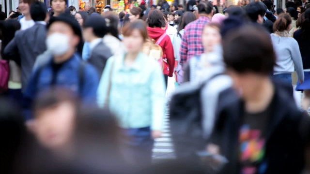 Shibuya pedestrian crossing people pollution vehicle transportation Tokyo 