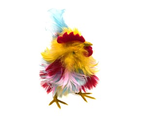 A colourful artificial chicken as a table decoration