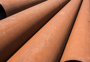 Rusty metal pipes stack