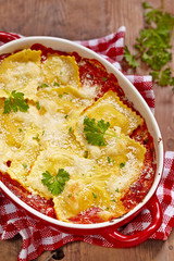 Baked ravioli in tomato sauce