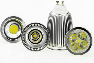 four GU10 LED bulbs with different sizes of chips and cooling