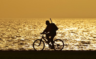 Fototapeta premium People, Sunset, Bicycle