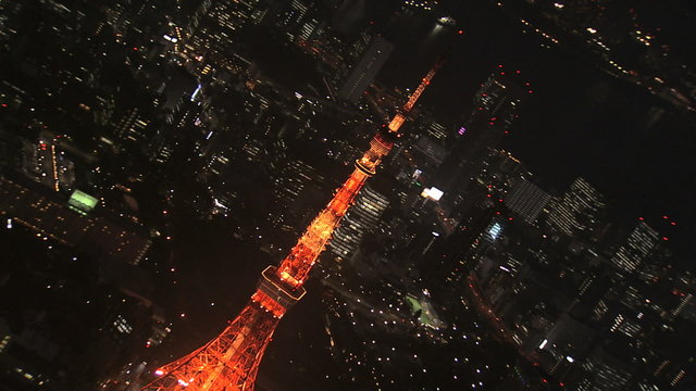 Aerial illuminated Metropolis city night Tokyo Bay Rainbow Bridge Odaiba Japan