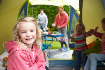 Fototapeta na wymiar Family Enjoying Camping Holiday On Campsite
