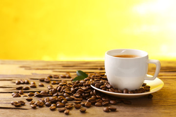 Cup of coffee on wooden table