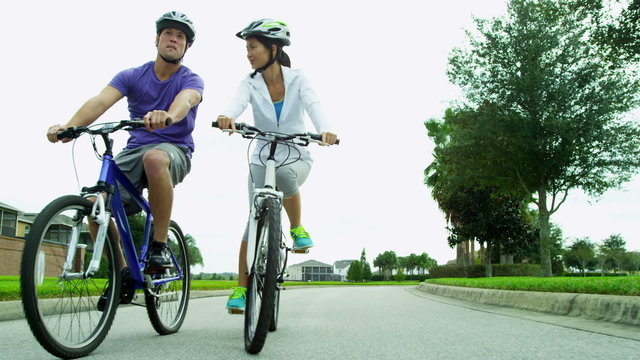 Healthy Lifestyle Cycling Young Ethnic Couple  