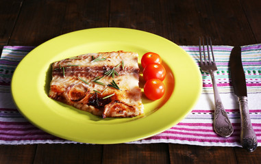 Dish of Pangasius fillet with rosemary and cherry tomatoes in