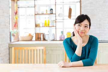 young asian woman in the kitchen