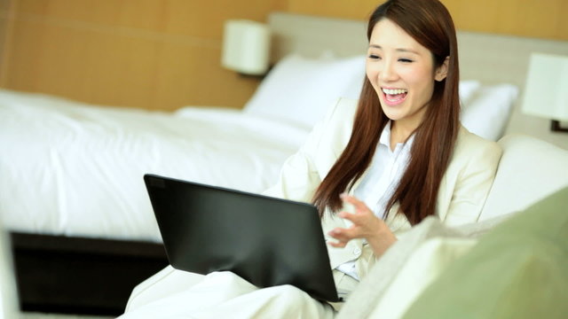 Ethnic Female Business Advisor Travel Hotel Room Leisure Skype Laptop