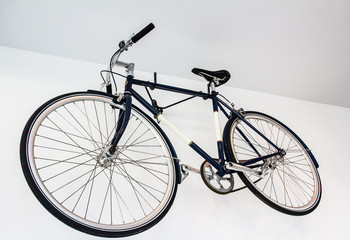 Fototapeta na wymiar bicycle fixed gear on white wall