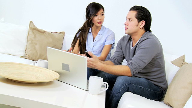 Asian Chinese Couple Needing Financial Solutions 