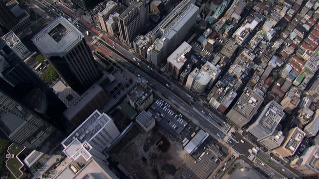 Aerial overhead Metropolis Business district commuter traffic Tokyo Japan 
