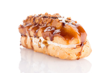 Eclair with caramel decoration