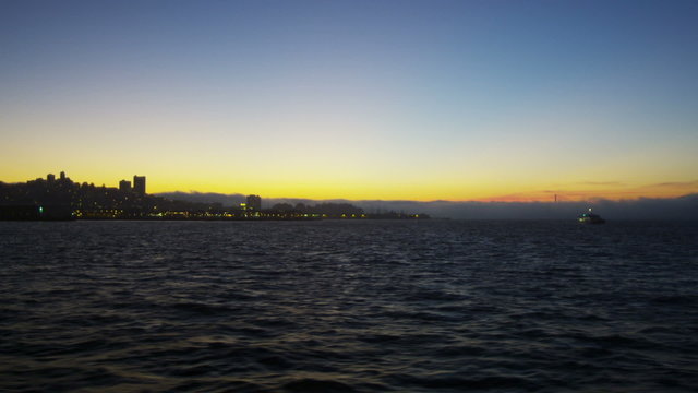 Fishermans Wharf area illuminated sunset San Francisco Bay, California, USA