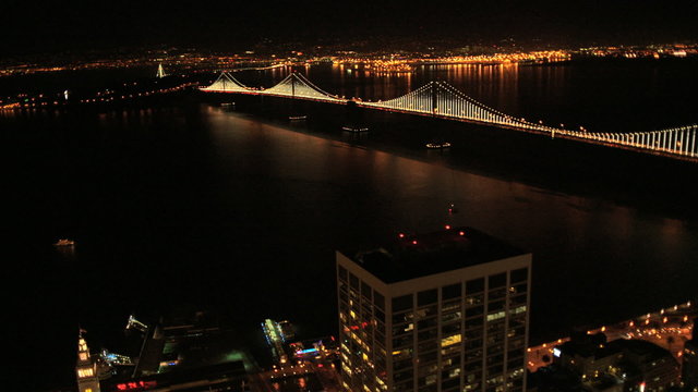 Aerial illuminated view Bridge bay, San Francisco, USA
