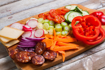 Sandwich ingredients on cutting board, closeup.
