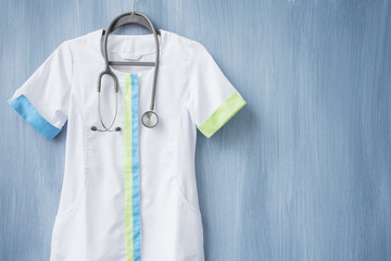Doctor uniform with stethoscope on hanger
