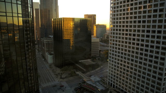Time lapse Los Angeles sunset shadow commuter traffic building California, USA