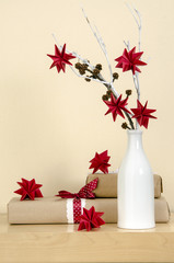 origami paper flowers in a vase