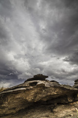 Cloudscape over rocks