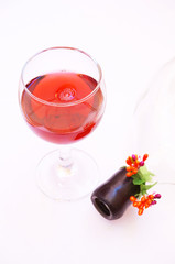 Wineglass and bottle