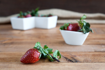 Beautiful strawberries on the wooden table