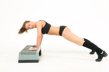 sport girl push-ups of step and smile