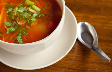 Traditional Thai Tom Yam soup on the table