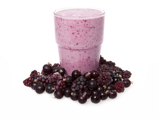 Smoothies of blackberry and black currant with yogurt on white b