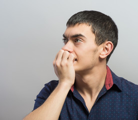 Portrait of Man Holding His Head in Stress