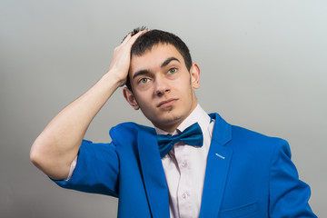 Portrait of Man Holding His Head in Stress
