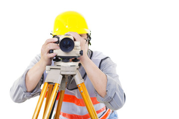 Surveyor worker making measurement  and isolated on white