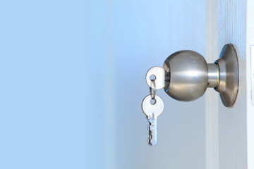 Open door with keys of house 