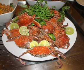 crabs with lime on the wood background