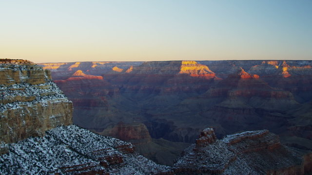 Grand Canyon snow National Park sunrise layers of rock panning, Arizona, USA