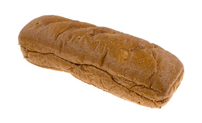 Whole wheat sub roll on a white background