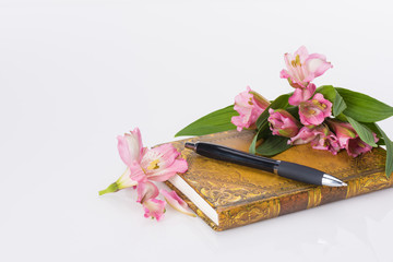 Valentines day, Mothers day concept. Love diary and flowers.