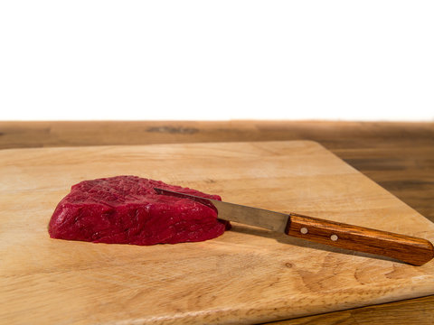 Meat Steak On Wood & Metal Knife