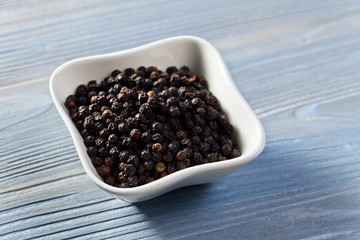 pepper on wooden table