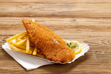 Fried fish and chips on a paper tray