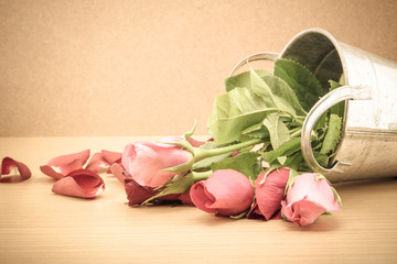 rose in aluminum pots on brown background,valentine day