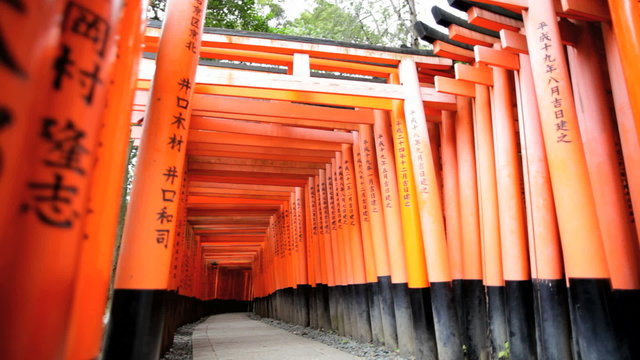 Torii gates Fushimi Inari Taisha shrine inscription Buddhist Kyoto Japan